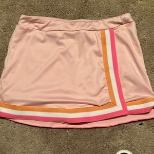 I’m selling a skirt that is pink orange and white